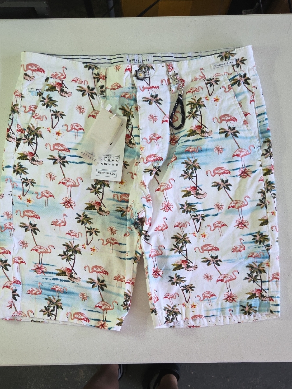 Denim & Flower White Swim Trunks with Pink Flamingo & Teal Wave Print